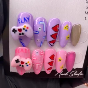 Gamer pink and purple press on nails set with retro gaming magnetic details
