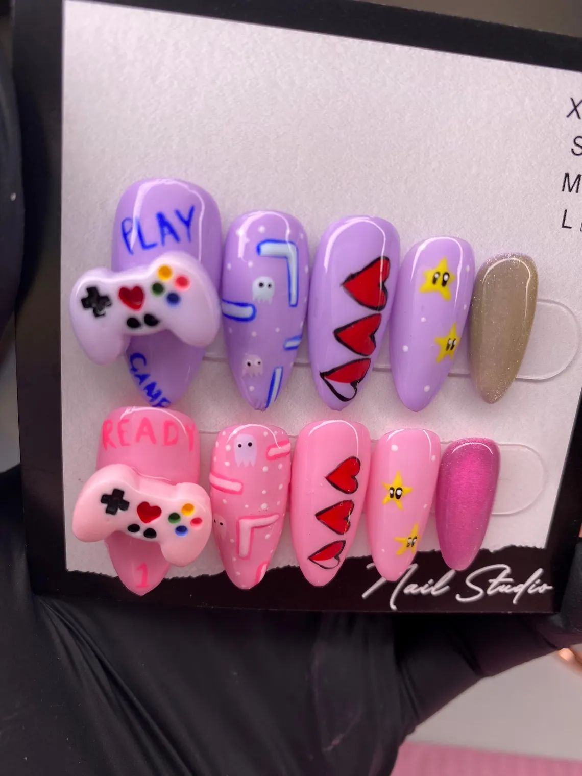 Gamer pink and purple press on nails set with retro gaming magnetic details Gamer pink and purple press on nails set with retro gaming magnetic details