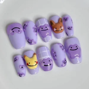 Handmade kawaii purple press on nails set with cute smiley faces and 3D animal charms