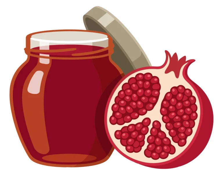a jar of delicious pomegranate jam with a half of fresh pomegranate isolated on white background