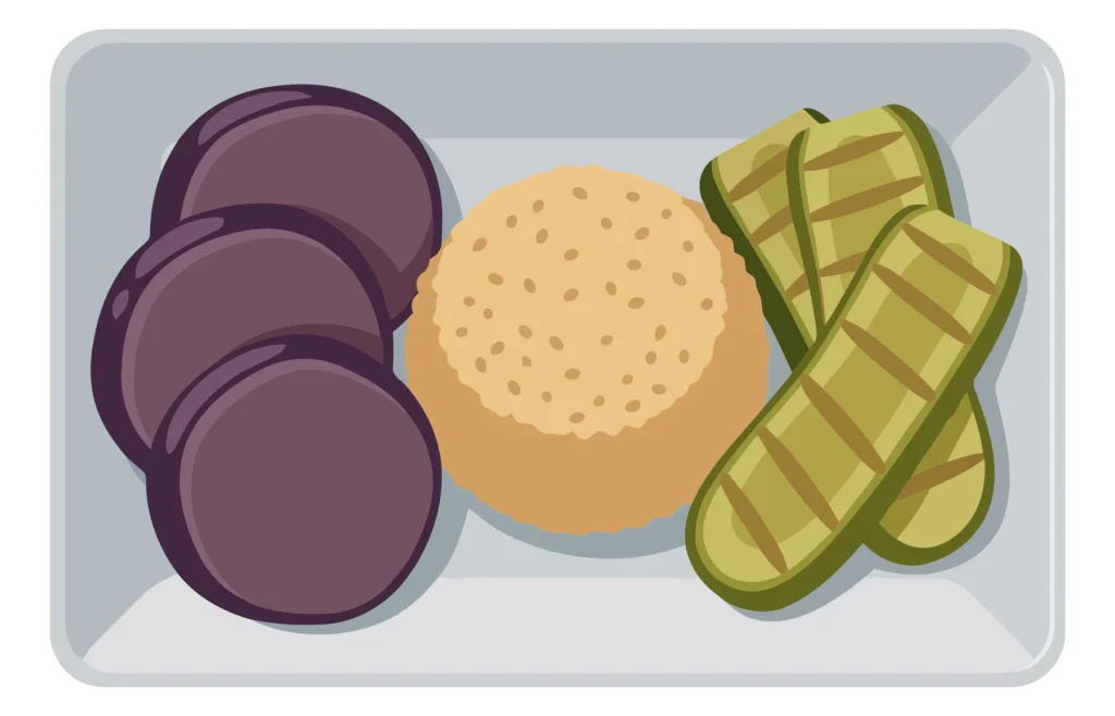 bento box with rice, sliced purple eggplant, and grilled zucchini