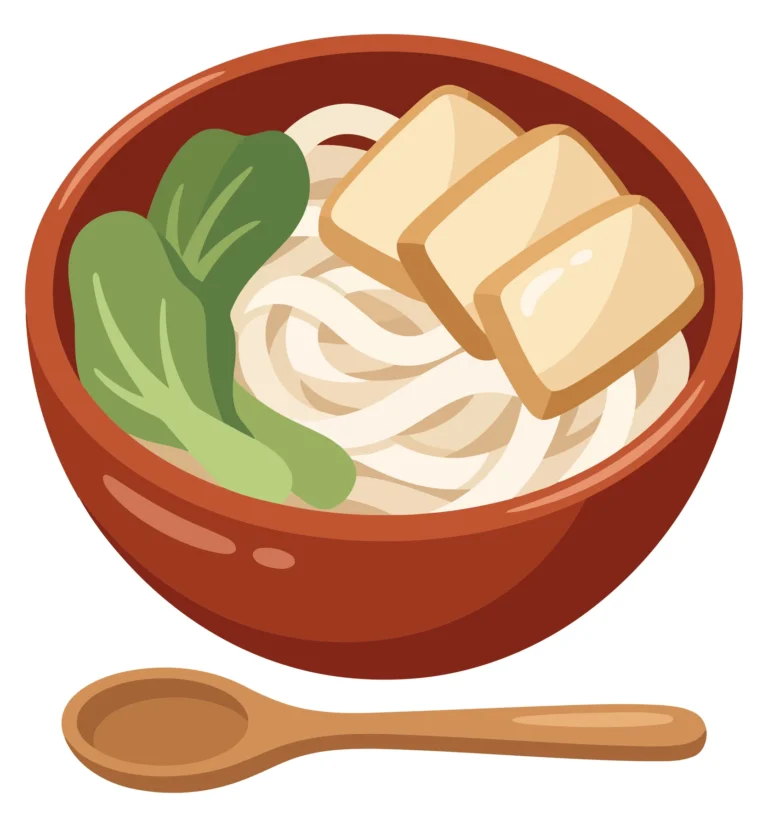 bowl of udon noodles with tofu and bok choy
