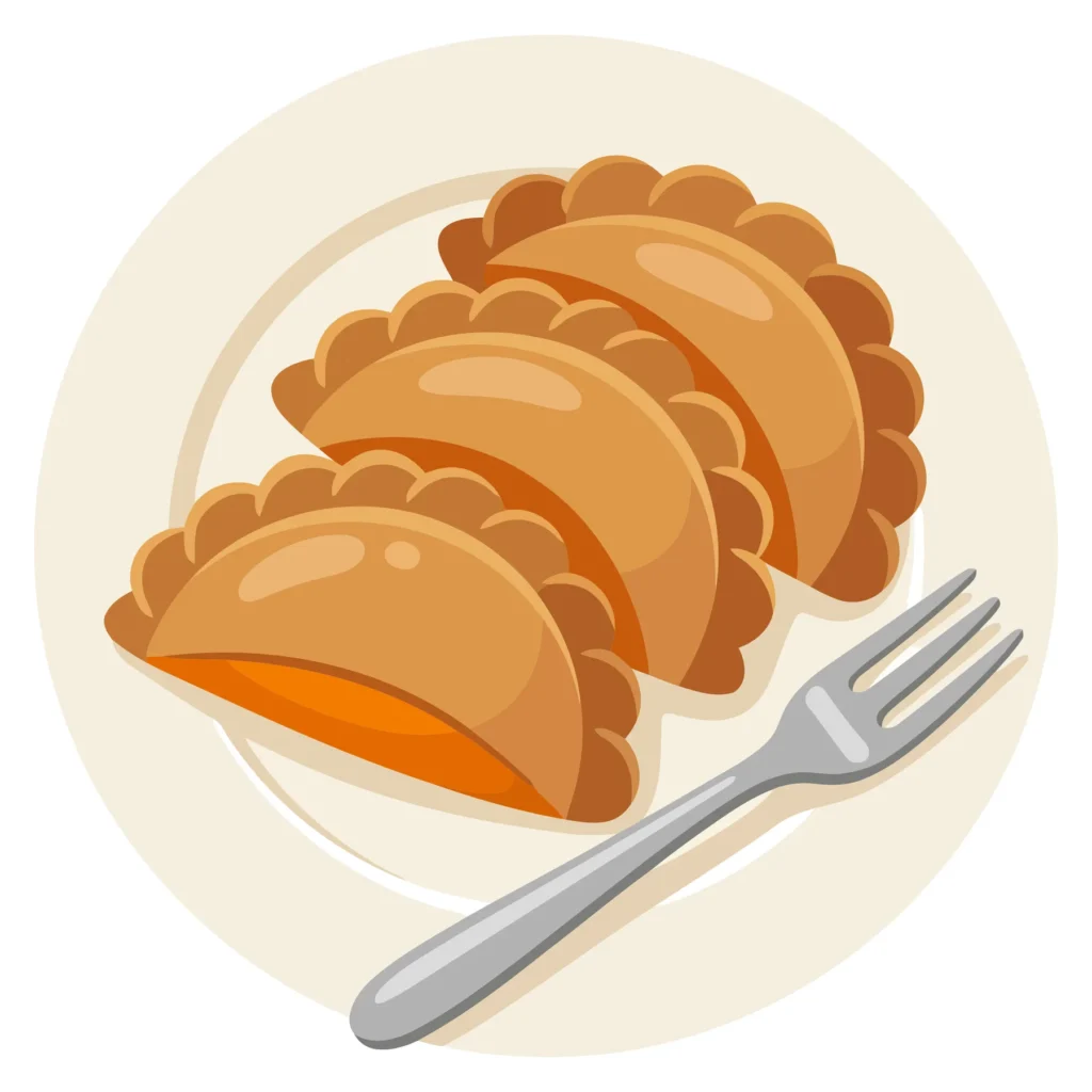 Empanadas On A Plate With A Fork Isolated On White Background empanadas on a plate with a fork isolated on white background