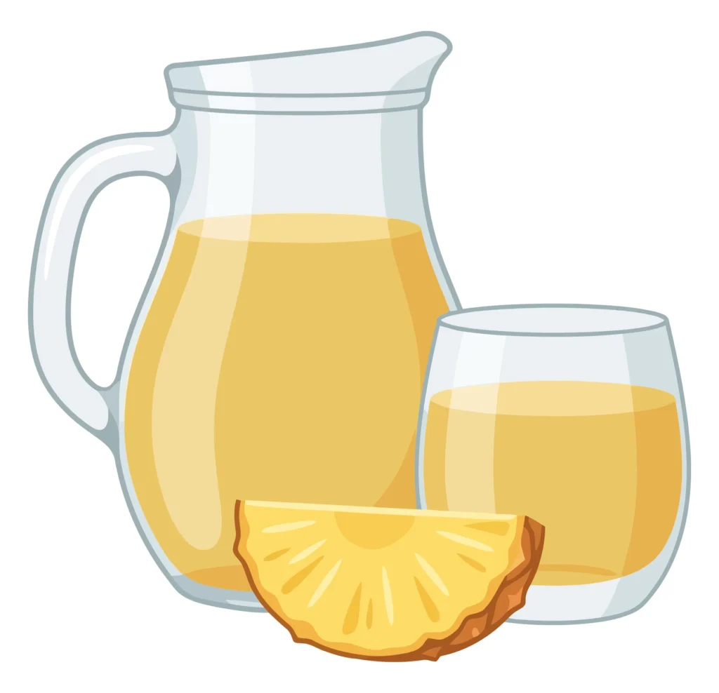 fresh pineapple juice in a glass pitcher and a glass cup with a pineapple slice