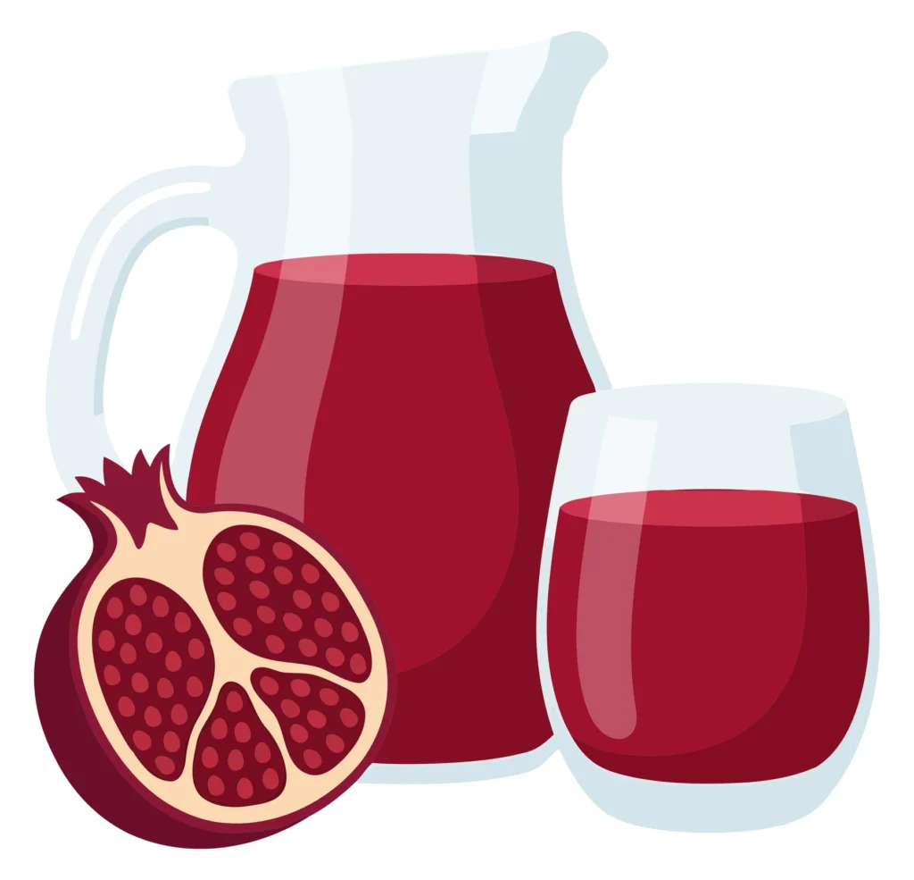 fresh pomegranate juice in glass pitcher and cup with halved fruit isolated on white background