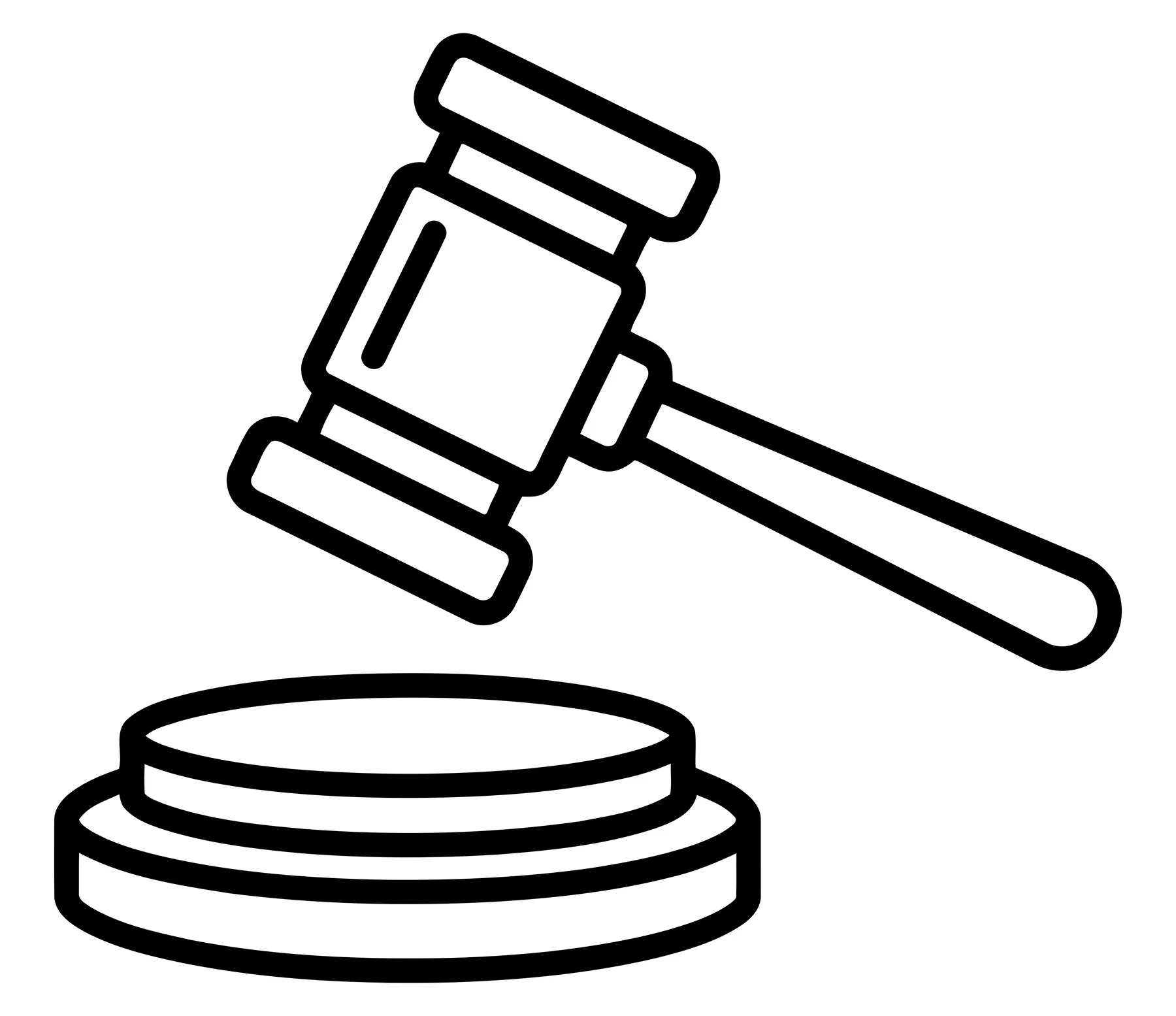 Black and white gavel and sounding block icon