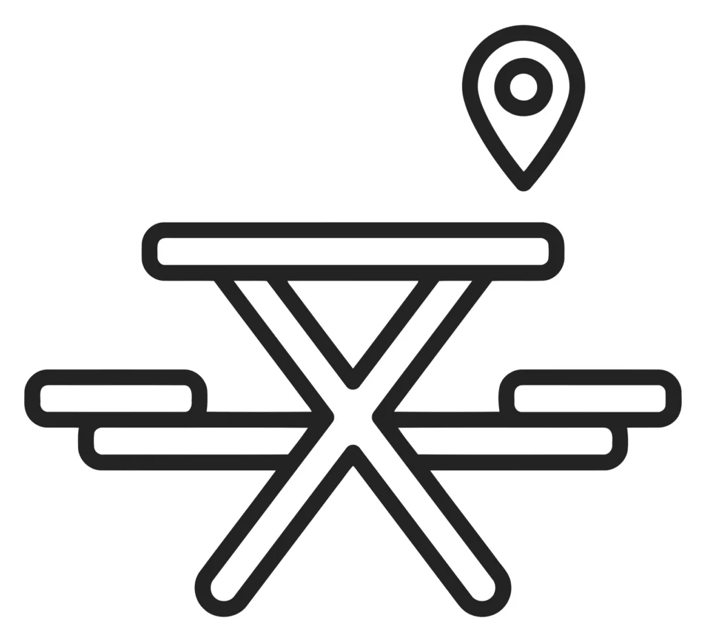 picnic table with location pin icon