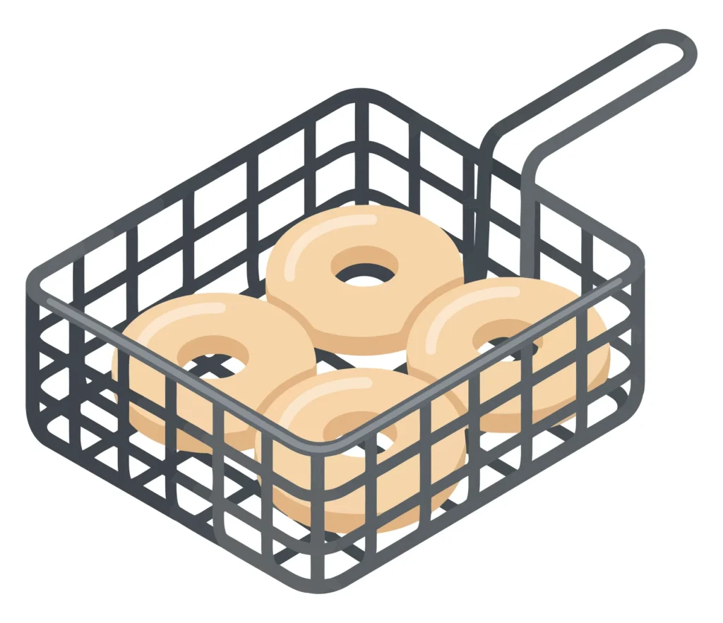 raw donuts in a deep fryer wire basket ready for frying, isolated on white background
