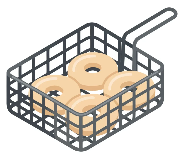 raw donuts in a deep fryer wire basket ready for frying, isolated on white background