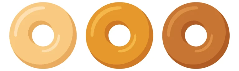set of three glossy doughnuts in different shades of brown and beige isolated on white background