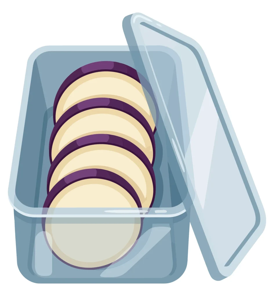transparent plastic container with sliced eggplant rounds inside with open lid isolated on white background