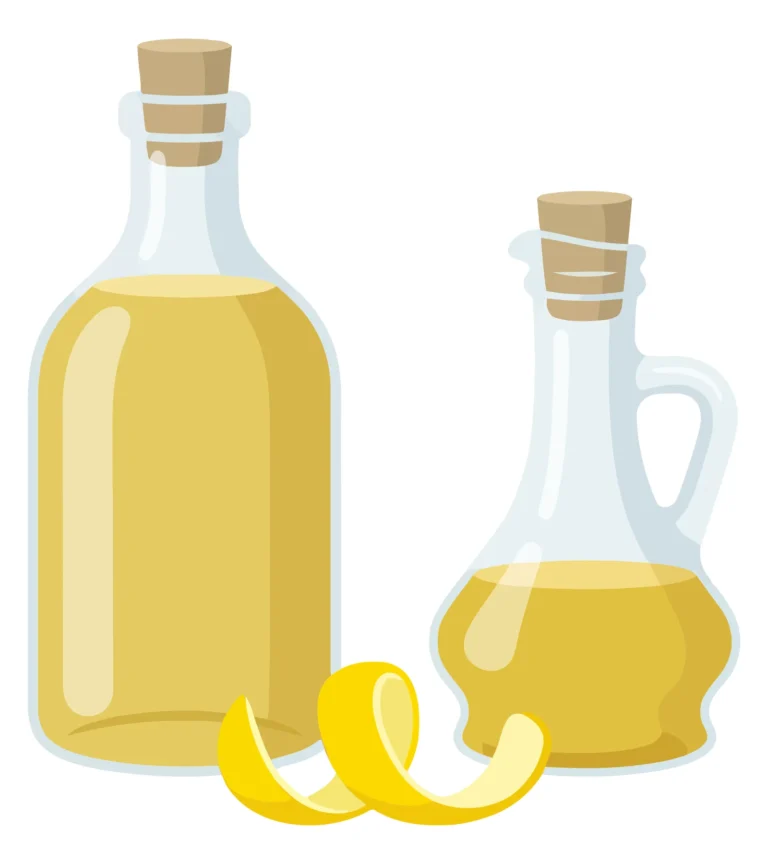 two glass bottles with lemon oil or juice and a lemon peel