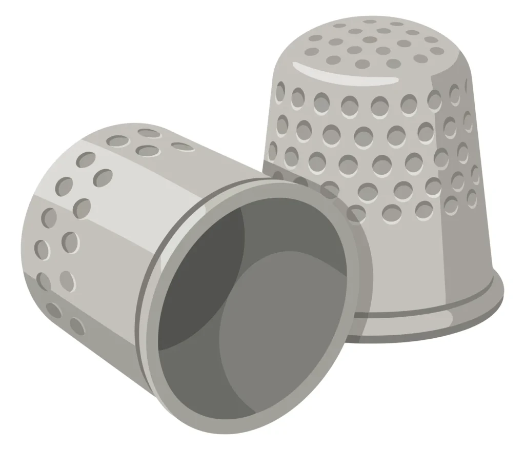 two silver sewing thimbles