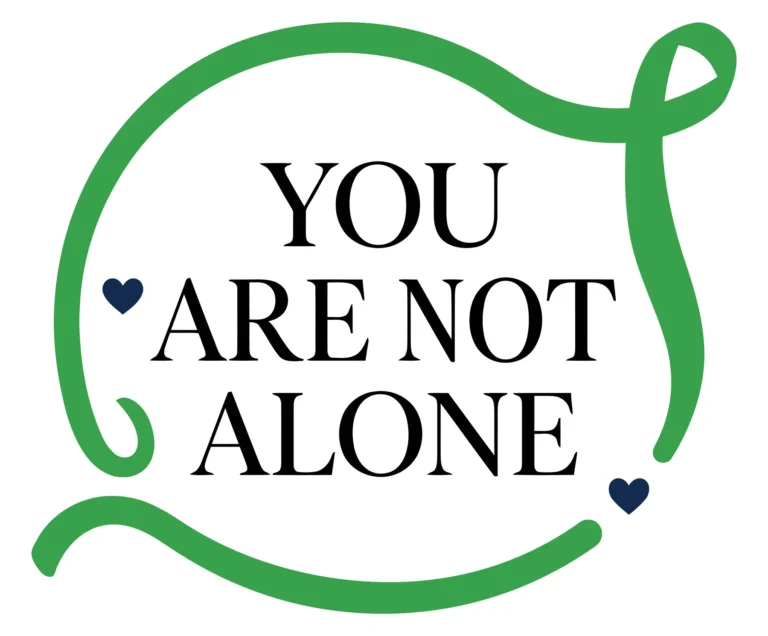 you are not alone text with green ribbon and hearts