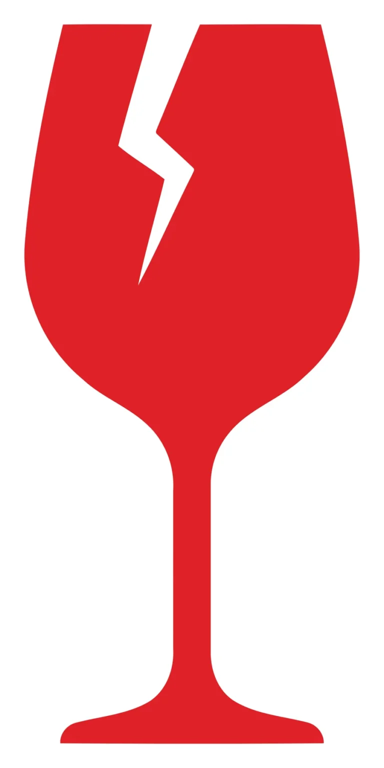 A red wine glass with a diagonal crack