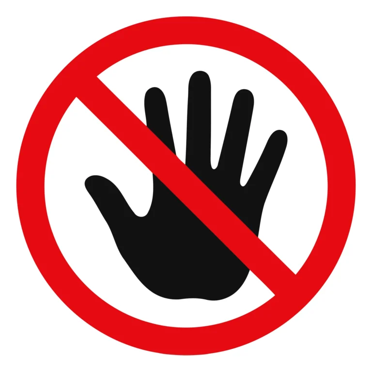 A prohibition sign showing a crossed-out hand inside a red circle