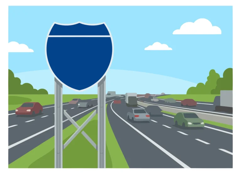 Blue highway merge sign on roadway with traffic