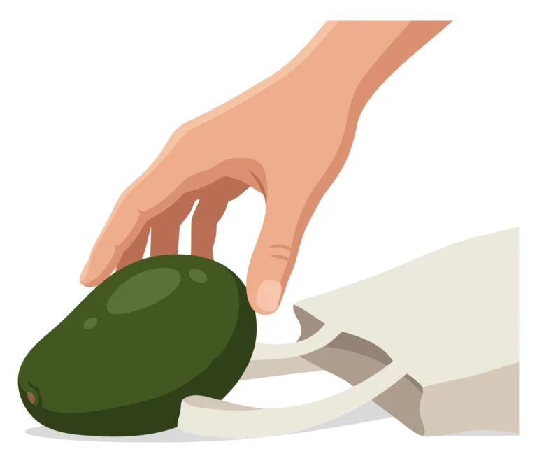 Hand pressing a green stylus or remote button on a flat surface