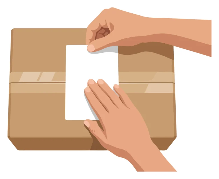 A person’s hands opening a cardboard box with a cut-out design