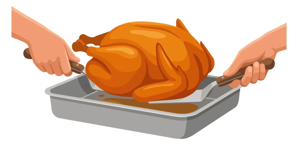 Hand roasting a whole turkey on a metal tray A hand roasting a turkey on a metal tray during a holiday meal preparation
