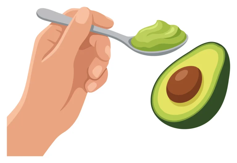A hand scoops avocado puree onto a spoon next to a whole avocado in an illustration