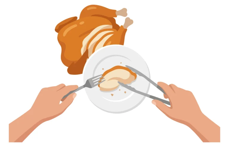 Hand holding plate with roasted turkey and mashed potatoes